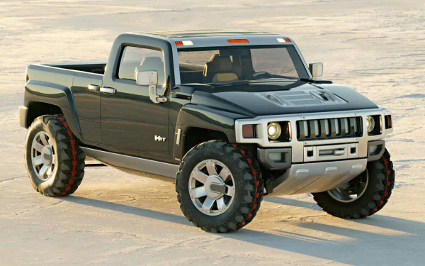 Hummer H3T Concept pickup on sand, rugged Hummer vehicle with oversized tires — HD PC desktop wallpaper and background.
