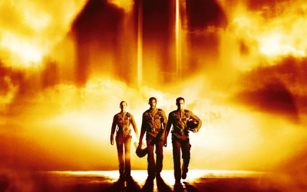 HD PC desktop wallpaper featuring three pilots walking forward with a fiery golden background, inspired by the movie Stealth.