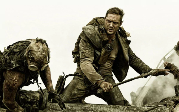 HD PC desktop wallpaper featuring Tom Hardy as Max Rockatansky in an intense scene from the movie Mad Max: Fury Road.