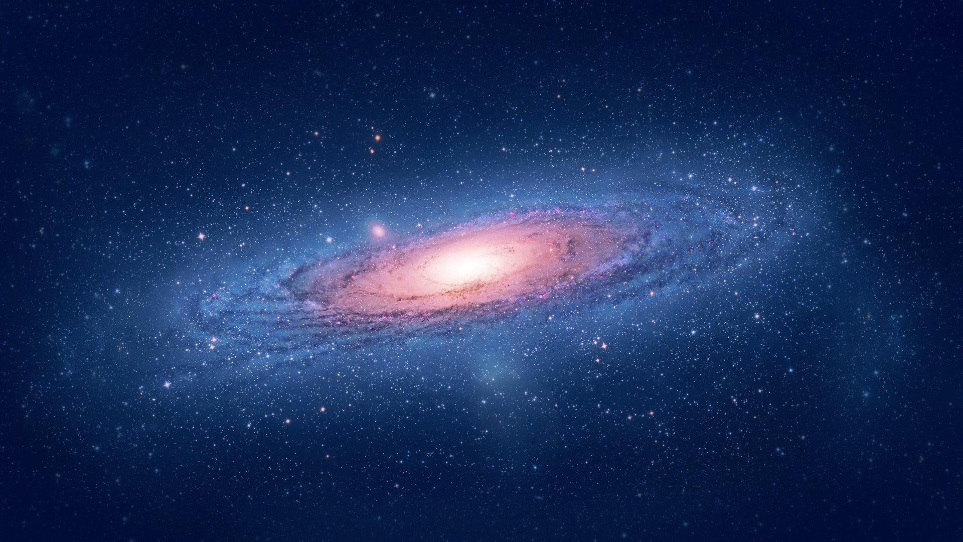 HD sci-fi desktop wallpaper featuring a vibrant, glowing galaxy with swirling stars and cosmic dust set against a deep blue space background.