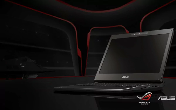 An Asus ROG notebook sits elegantly on a sleek, dark surface, embodying cutting-edge technology against a minimalist, high-definition backdrop.
