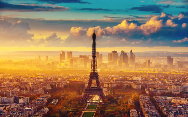 HD desktop wallpaper of Paris, featuring the Eiffel Tower with a dramatic sunset in the background and a stunning cityscape view.