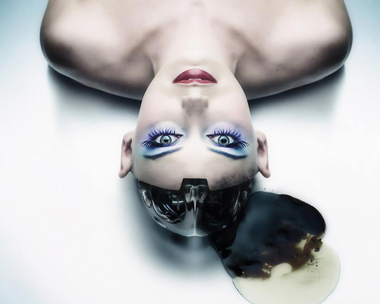 HD PC desktop wallpaper featuring a sci-fi cyborg with pale skin, striking makeup, and a mechanical skull exposed on one side of the head against a white background.