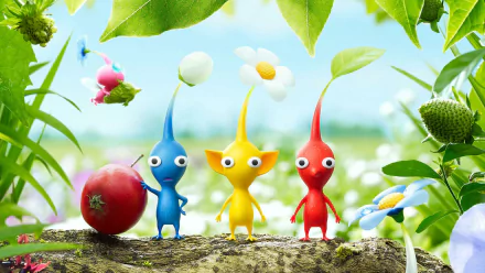 HD PC desktop wallpaper featuring three colorful Pikmin characters from the video game series standing on soil with plants and a tomato in a bright outdoor setting.
