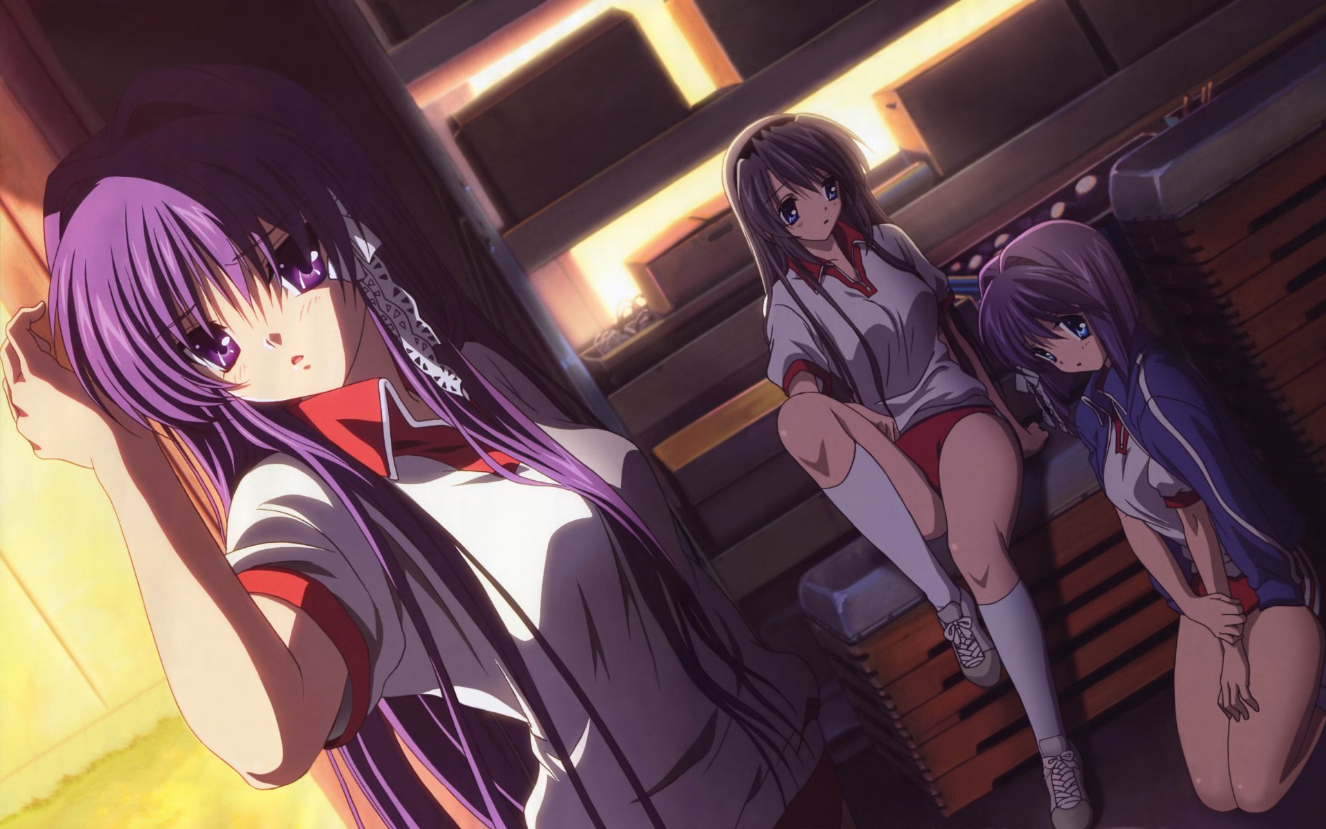 4K Ultra HD anime wallpaper featuring Tomoyo Sakagami, Ryou Fujibayashi, and Kyou Fujibayashi from Clannad, dressed in shorts and socks, seated in a warmly lit setting.