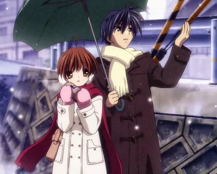 HD PC desktop wallpaper featuring anime characters Tomoya Okazaki and Nagisa Furukawa from Clannad standing under an umbrella in a rainy urban setting.