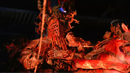 HD desktop wallpaper featuring a dynamic scene related to The Fisher King, with vivid red and orange tones in a dark setting.