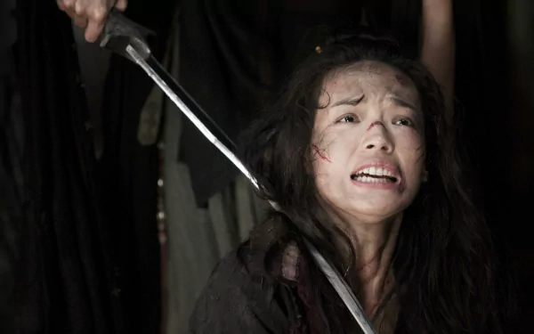 HD desktop wallpaper featuring a dramatic scene from Journey To The West with a distressed woman wielding a sword.