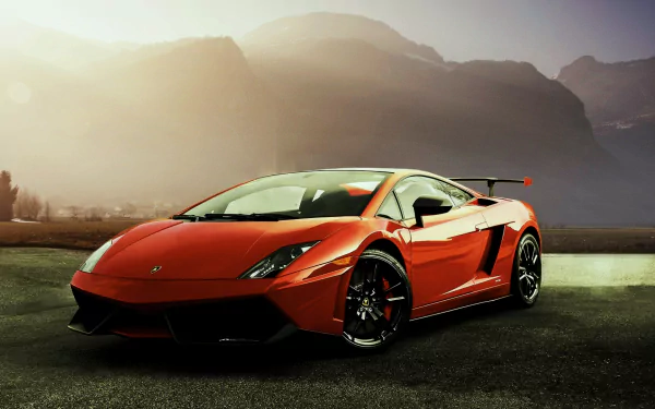 HD desktop wallpaper of a striking Lamborghini Gallardo supercar set against a stunning mountainous backdrop.