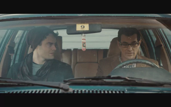 HD desktop wallpaper from The Skeleton Twins, featuring two characters sitting inside a car.