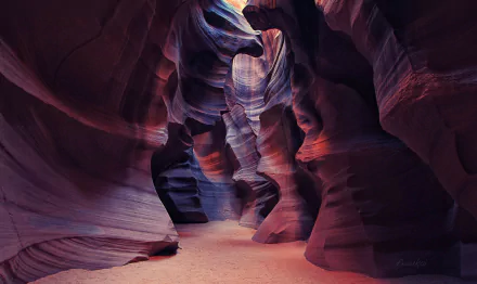 HD desktop wallpaper showcasing the vibrant, winding sandstone formations of Antelope Canyon, a stunning natural cave in Arizona.