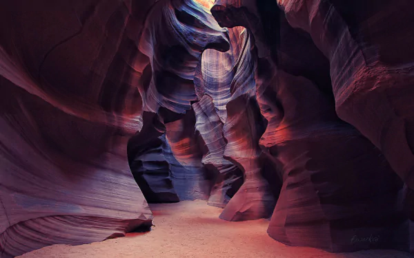 HD desktop wallpaper showcasing the vibrant, winding sandstone formations of Antelope Canyon, a stunning natural cave in Arizona.