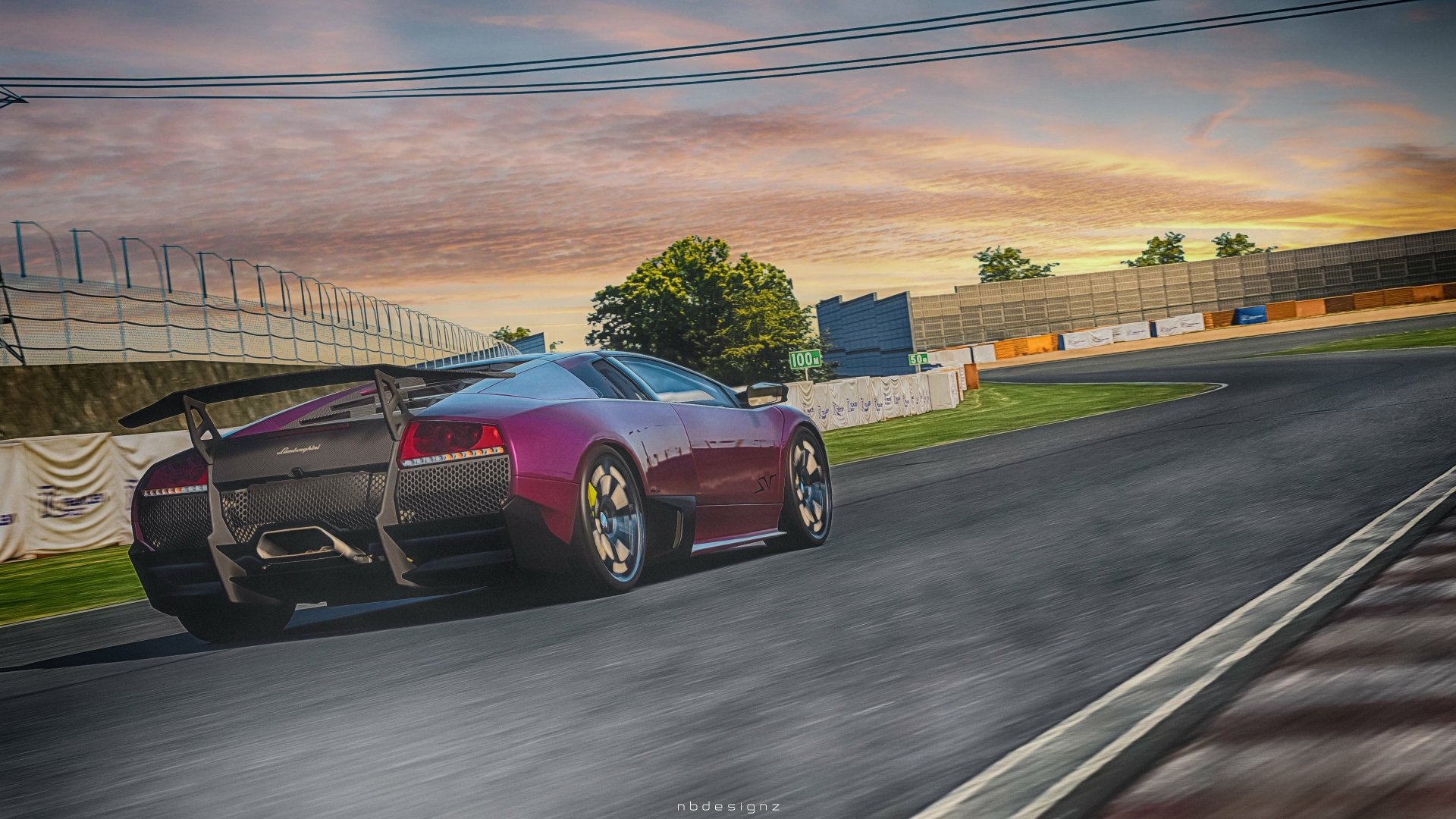 A sleek Lamborghini Murcielago speeds on a racetrack under a colorful sky, captured in 4K Ultra HD for a dynamic PC desktop wallpaper.