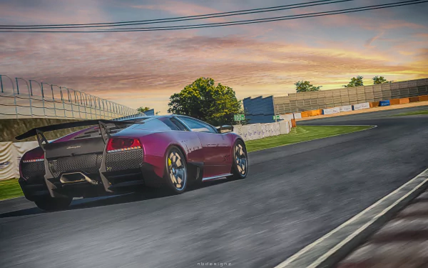 A sleek Lamborghini Murcielago speeds on a racetrack under a colorful sky, captured in 4K Ultra HD for a dynamic PC desktop wallpaper.