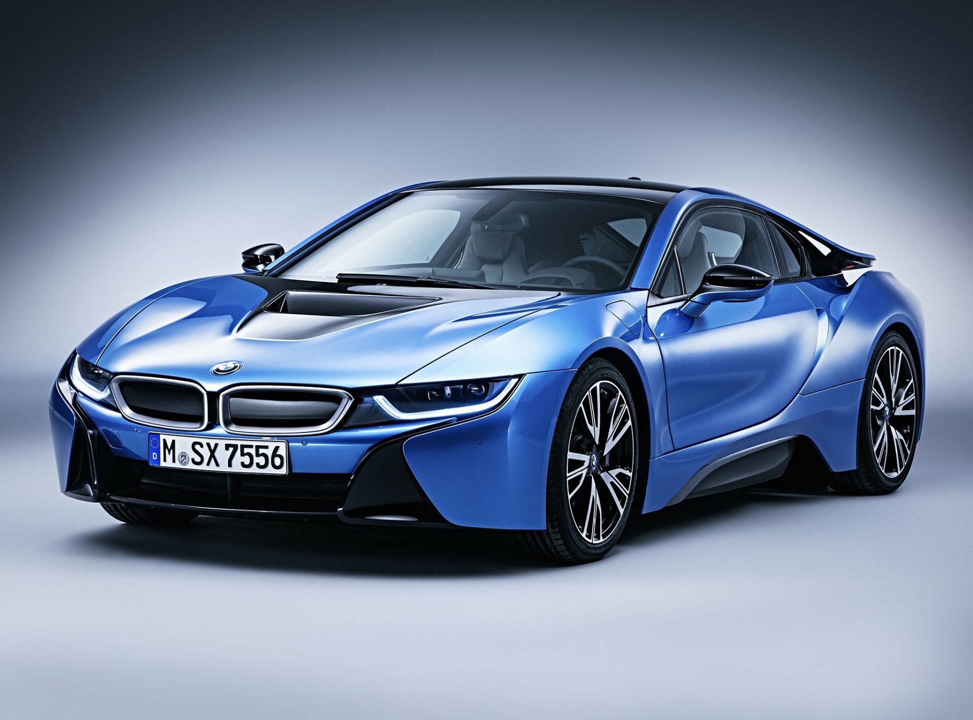 A sleek blue BMW i8 sports car displayed as an HD PC desktop wallpaper and background.