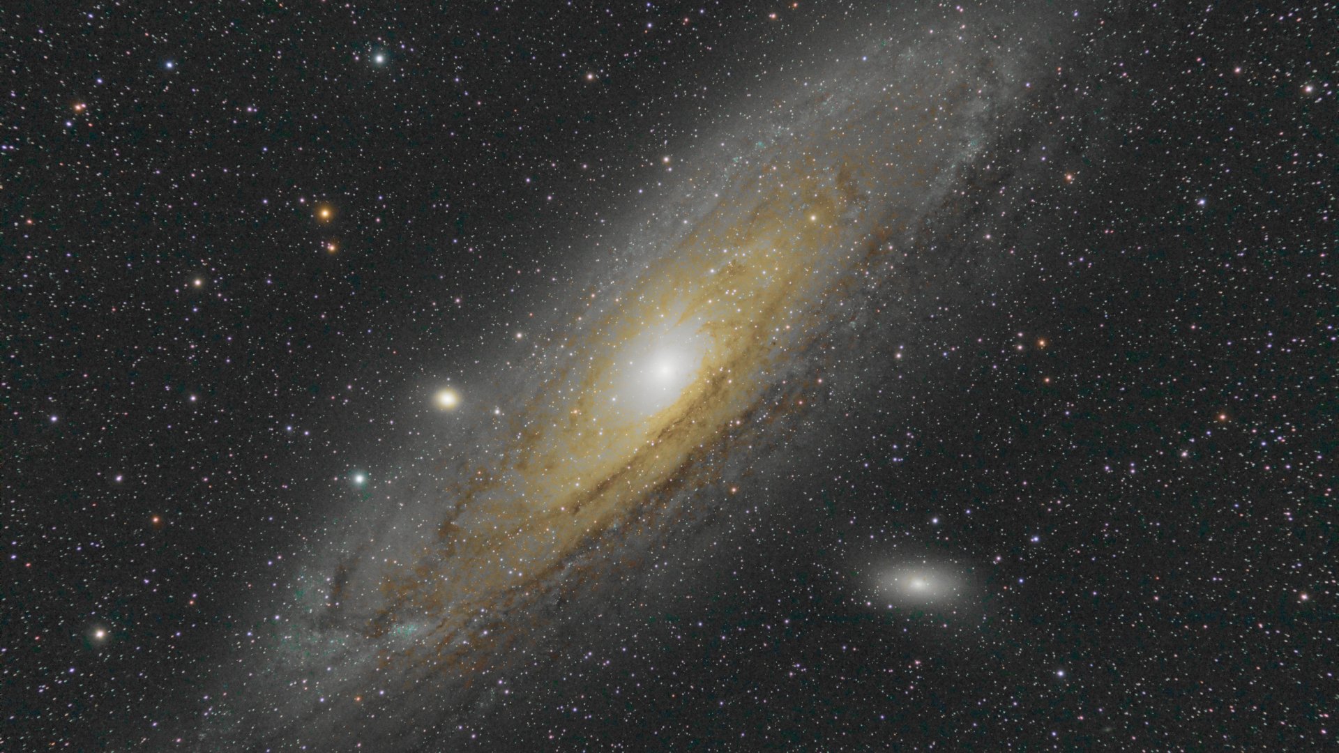 A stunning HD desktop wallpaper featuring a vibrant galaxy with swirling stars and cosmic details, capturing the essence of space and sci-fi exploration.