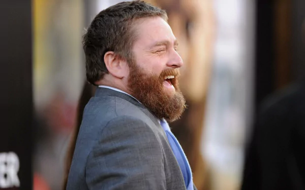 HD desktop wallpaper featuring a smiling man at an event, creating a joyful background ambiance.
