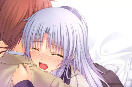A heartwarming scene from the anime Angel Beats! featuring Yuzuru Otonashi embracing Kanade Tachibana, captured in vibrant HD for a striking desktop wallpaper.