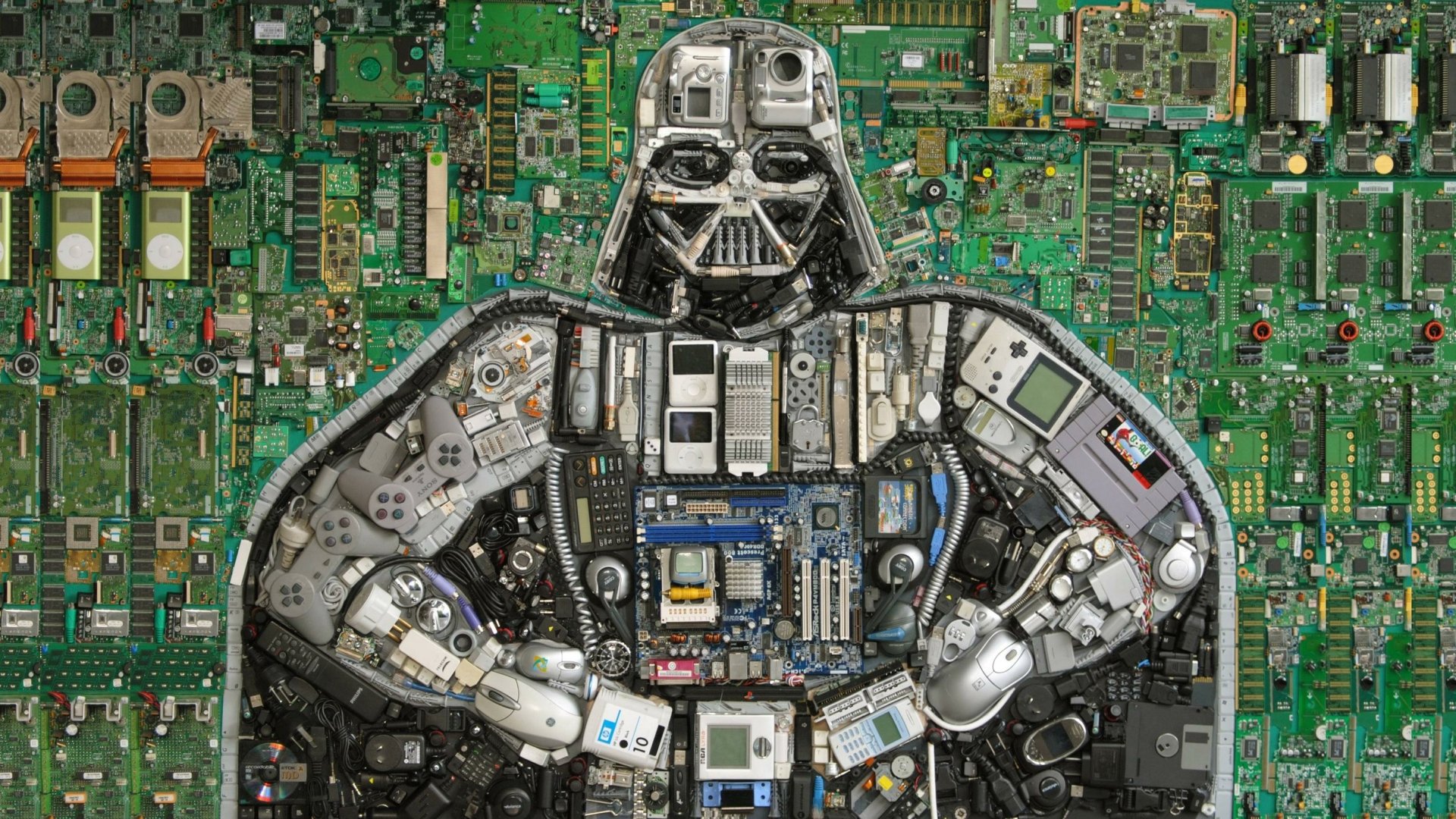 A striking HD wallpaper featuring Darth Vader crafted from various electronic components, set against a backdrop of circuit boards, embodying a unique blend of sci-fi and technology.