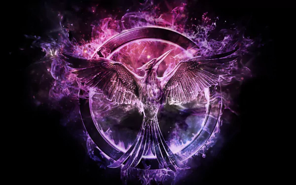 HD PC desktop wallpaper featuring a detailed, glowing mockingjay emblem from the video game The Hunger Games: Panem Rising in vibrant purple and pink hues.