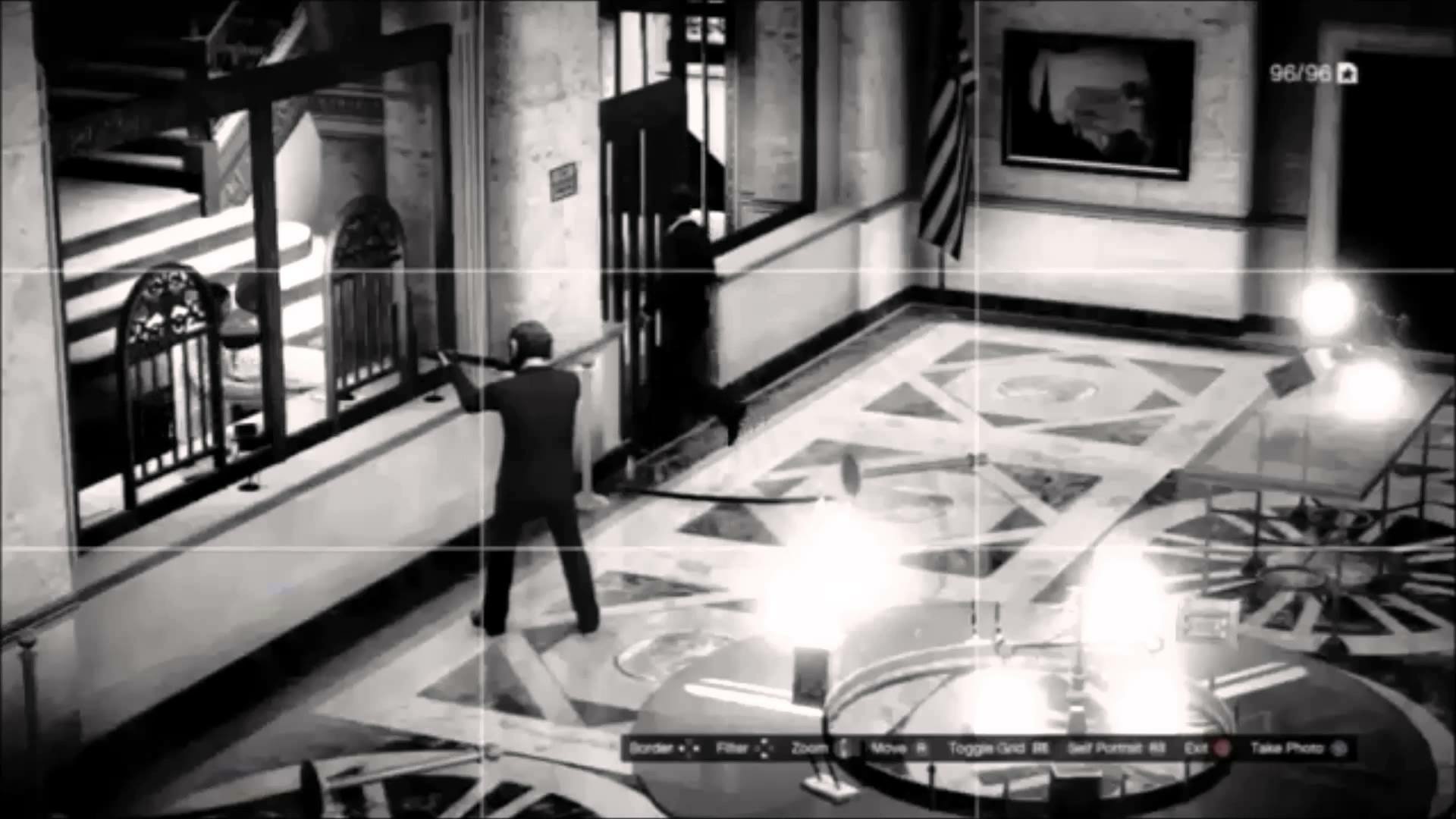 HD PC desktop wallpaper depicting a heist scene from Grand Theft Auto V, showing a character aiming a gun inside a building, captured through a camera interface.