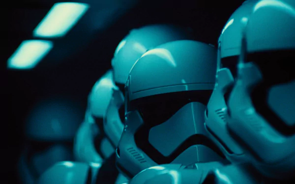 A high-definition desktop wallpaper featuring a close-up of Stormtroopers from the movie Star Wars Episode VII: The Force Awakens, bathed in a blue light.