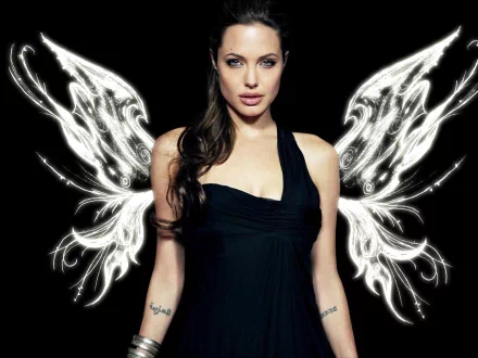 A striking HD wallpaper featuring Angelina Jolie with ethereal, artistic wings, set against a dramatic black background, highlighting her captivating presence.
