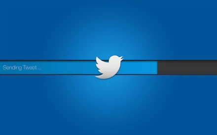 A vibrant blue desktop wallpaper featuring the Twitter logo alongside a loading bar, symbolizing the process of sending a tweet. Ideal for tech enthusiasts and Twitter users.