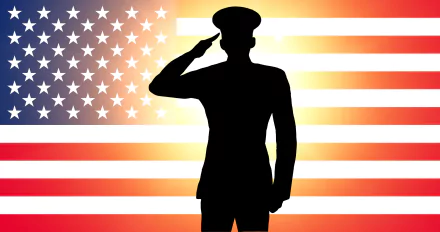 Silhouette of a soldier saluting in front of a glowing American flag, a 4K Ultra HD Memorial Day holiday PC desktop wallpaper and background.