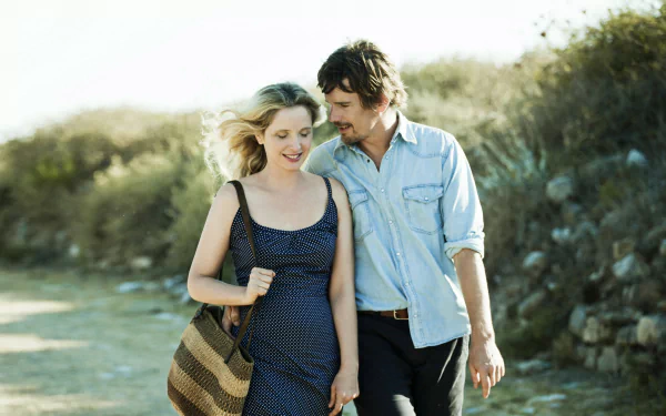 Julie Delpy and Ethan Hawke walking outdoors in a scene from the movie Before Midnight, captured in a 4K Ultra HD PC desktop wallpaper.