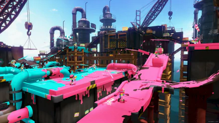 HD Splatoon-themed desktop wallpaper featuring colorful in-game battle arena with pink and blue ink.