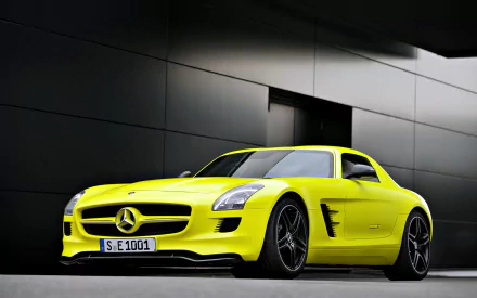 A striking yellow Mercedes-Benz SLS AMG supercar parked against a sleek, modern dark wall, showcased in crisp 4K Ultra HD quality.