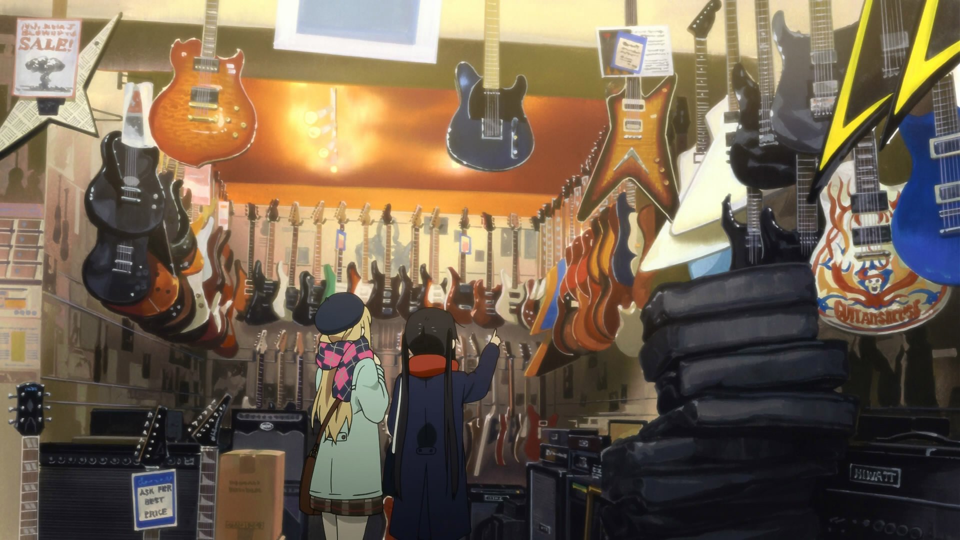 HD PC desktop wallpaper featuring Tsumugi Kotobuki and Azusa Nakano from the anime K-ON! browsing a vibrant guitar shop filled with various electric guitars.