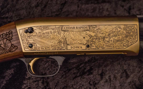 Close-up of a man-made shotgun with detailed engraving showcasing Iowa's history, captured in 4K Ultra HD for a PC desktop wallpaper and background.