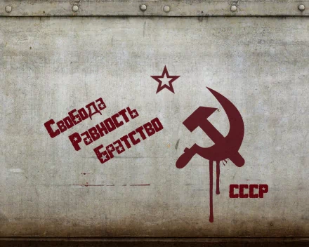 A high-definition desktop wallpaper depicting Soviet-era symbols such as the hammer and sickle, a red star, and Cyrillic text promoting communism on a textured background.