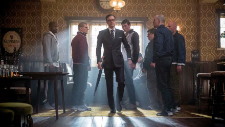 Colin Firth stands confidently at the center of a tense scene from Kingsman: The Secret Service, surrounded by a group of men in a vintage, dimly lit setting. A stylish 4K Ultra HD wallpaper.