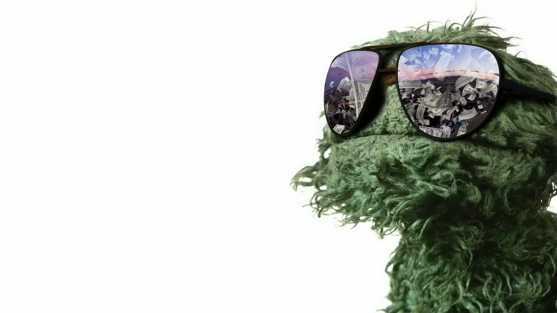 HD PC desktop wallpaper featuring a close-up of Oscar the Grouch from the TV show Sesame Street wearing reflective sunglasses against a white background.