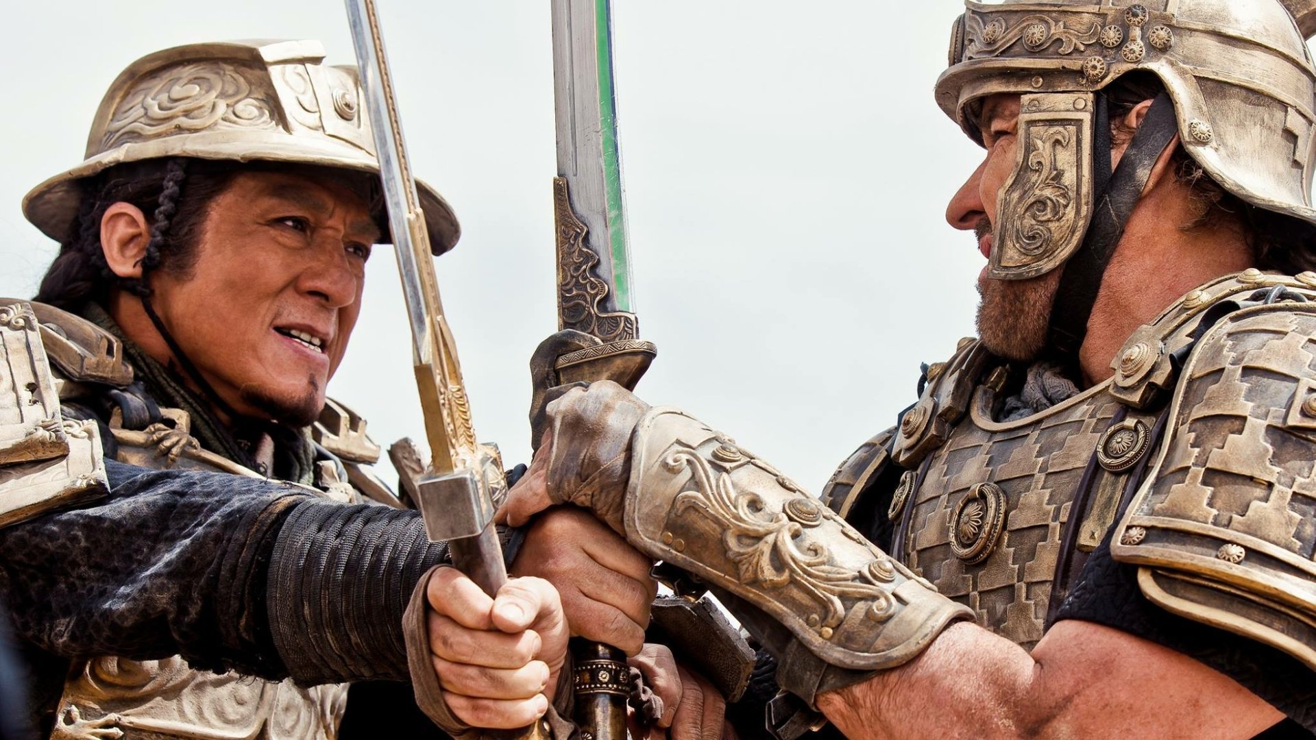HD PC desktop wallpaper from the movie Dragon Blade, featuring two armored warriors locked in intense sword combat.