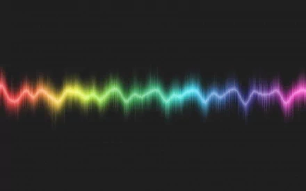 HD desktop wallpaper showcasing an artistic, colorful waveform pattern against a black background.