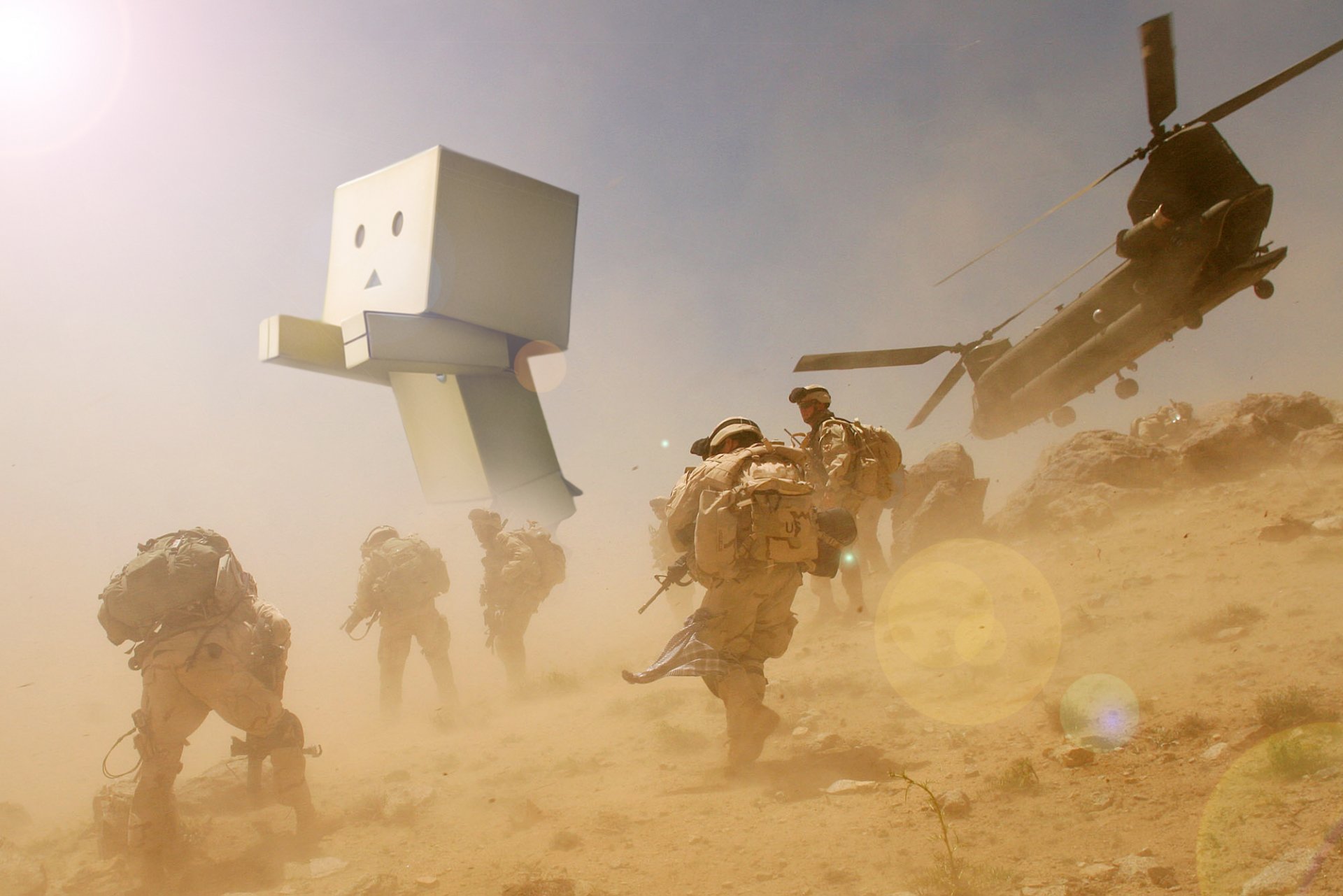 Misc danbo HD PC desktop wallpaper background: giant Danbo figure strides through a sandy battlefield as soldiers and a helicopter kick up dust.