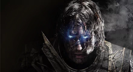 Talion from Middle-earth: Shadow of Mordor stares intensely, illuminated by glowing blue eyes, set against a dark backdrop in this striking 8K Ultra HD wallpaper.