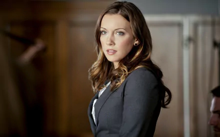 Katie Cassidy as a character from Arrow (TV Show), featured in a high-definition PC desktop wallpaper and background.