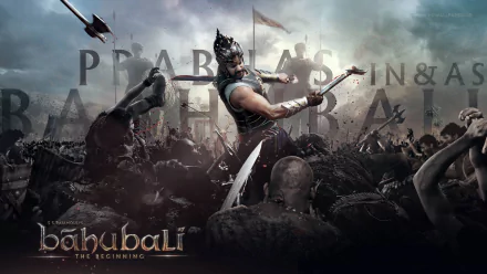 HD PC desktop wallpaper featuring Prabhas in an intense battle scene from the movie Baahubali: The Beginning.