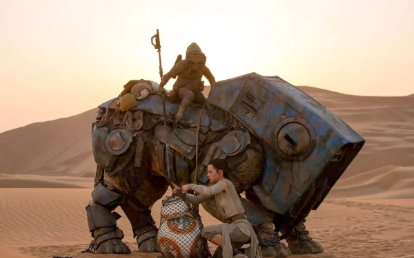 Daisy Ridley as Rey interacts with BB-8 in a desert scene from Star Wars Episode VII: The Force Awakens, showcasing a stunning moment from the iconic film.