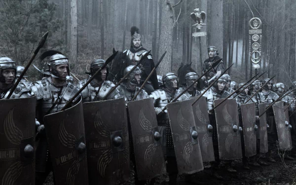 HD PC desktop wallpaper showing Roman soldiers in formation from the movie Centurion, set in a misty forest with shields and armor.