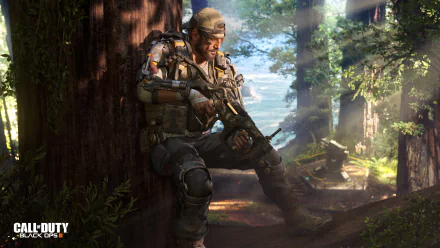 HD desktop wallpaper of a soldier from Call Of Duty: Black Ops III, resting against a tree in a dense, sunlit forest with a futuristic weapon in hand.