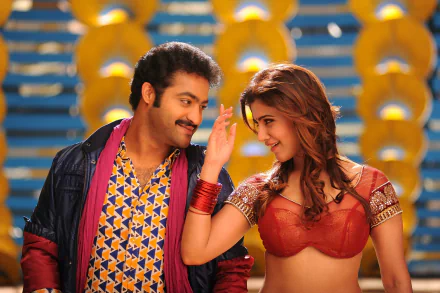 HD desktop wallpaper featuring N. T. Rama Rao and Samantha Akkineni from the movie Rabhasa, showcasing a vibrant and lively scene.