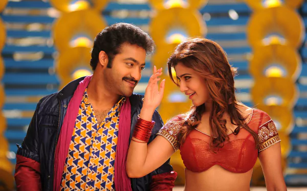 HD desktop wallpaper featuring N. T. Rama Rao and Samantha Akkineni from the movie Rabhasa, showcasing a vibrant and lively scene.
