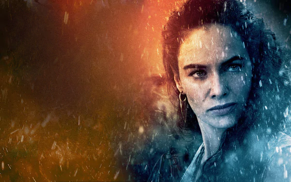 Close-up of a stern woman as a character in the movie 300: Rise of an Empire, stormy rain-and-fire lighting; 2K Quad HD desktop wallpaper.