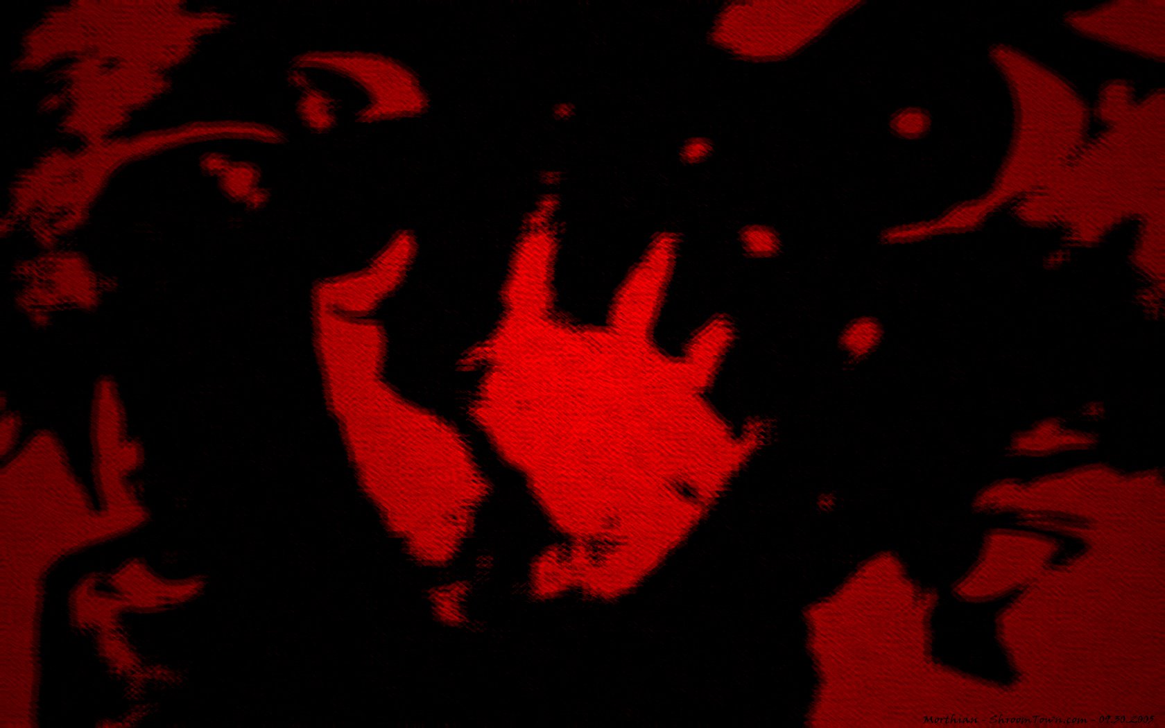 An abstract artistic wallpaper featuring a striking red hand against a dark background, creating a bold and dramatic visual impact for your desktop.